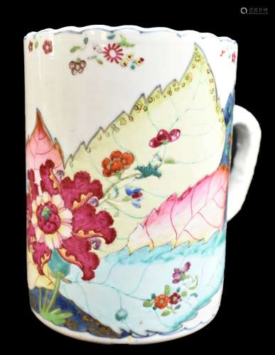 An 18th century Chinese porcelain Famille Rose mug, painted in enamels with floral decoration,