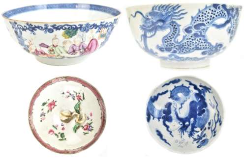 A 19th century Chinese porcelain bowl painted in underglaze blue with two dragons chasing the