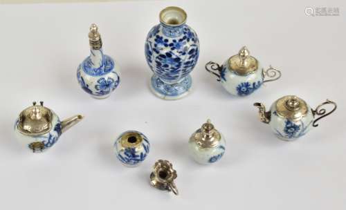 A 19th century Chinese miniature porcelain toy/doll's tea set, jug and two vases, floral painted