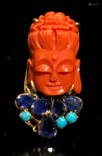A CORAL BUDDHA PENDANT EMBEDDED WITH 18K GOLD