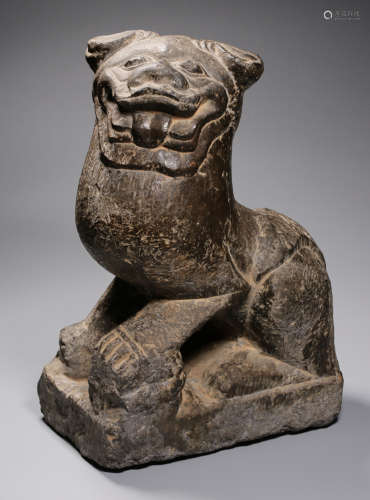 A STONE ORNAMENT SHAPED WITH LION