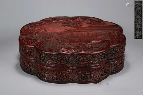 A RED LACQUER BOX CARVED WITH STORY PATTERN