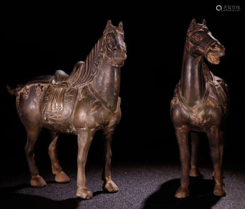 A COPPER ORNAMENT SHAPED WITH HORSE