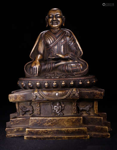 A COPPER BUDDHA STATUE