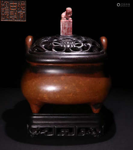 A COPPER CARVED EAR CENSER