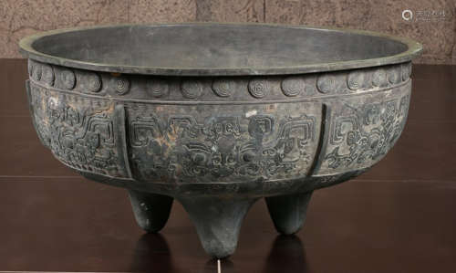 A COPPER CONTAINER CARVED WITH BEAST PATTERN