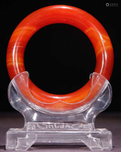 AN AGATE CARVED BANGLE