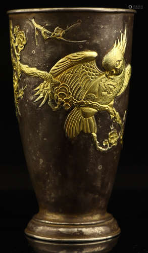 A GILT SILVER CAST CUP