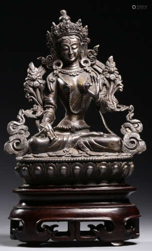 A SILVER CAST TARA BUDDHA STATUE