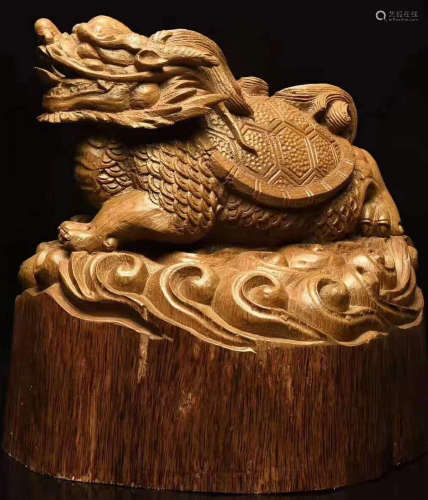 AN INDONISIA CHENXIANG WOOD BEAST SHAPE PENDANT