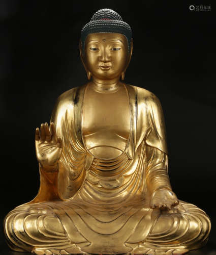 A TIBETAN GOLD LACQUER SAKYAMUNI BUDDHA STATUE