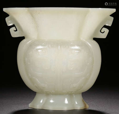 A XINJIANG HETIAN JADE CARVED BEAST PATTERN VASE