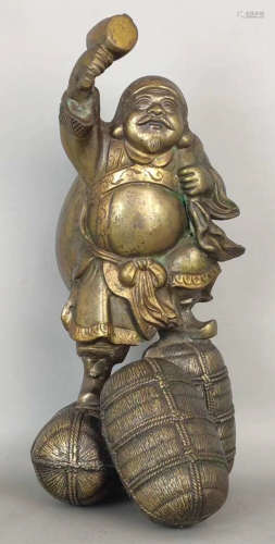 A COPPER CAST CAISHEN BUDDHA STATUE