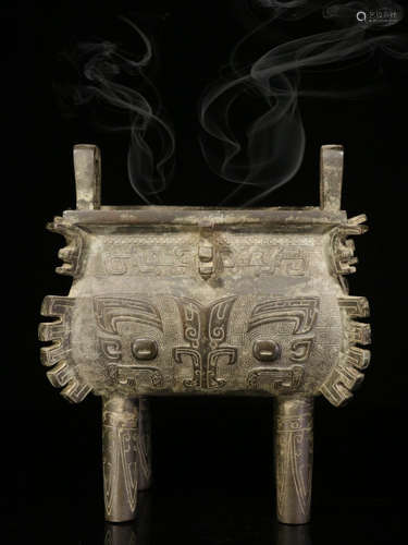 A COPPER CAST BEAST PATTERN CENSER