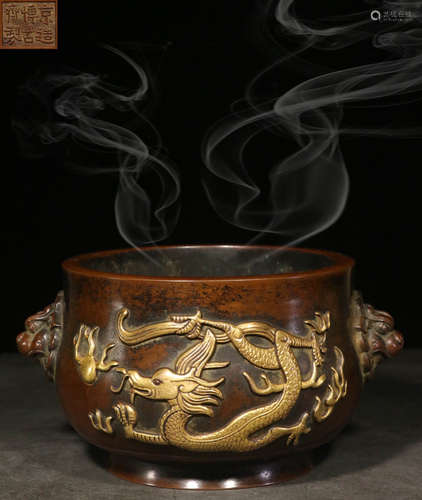 A GILT BRONZE CAST DRAGON PATTERN CENSER