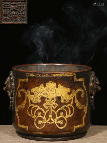 A GILT BRONZE CAST BAT PATTERN CENSER