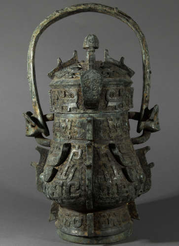Ancient Chinese bronze liang you, a container for alcohol.中國古代提梁卣
