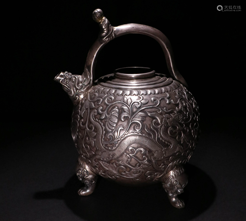 A SILVER POT WITH HANDLE