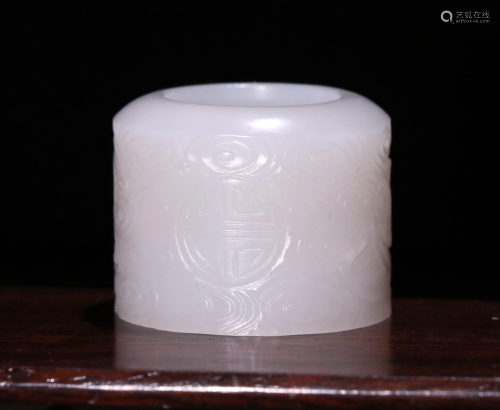 A CHINESE VINTAGE WHITE JADE TH…