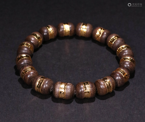 AN OLD AGARWOOD HAND CHAIN