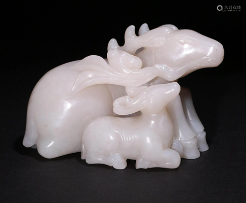 A HETIAN JADE DISPLAY FIGURINE