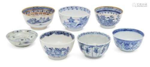 Six Chinese porcelain tea bowls, 18th-19th century, four painted in underglaze blue with abstract