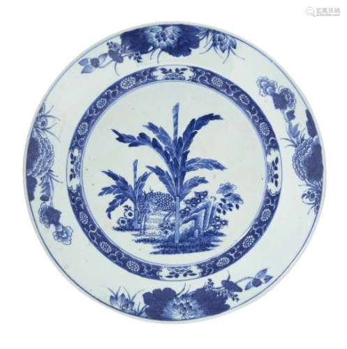 A Chinese export porcelain dish, 18th century, painted in underglaze blue with a deer amongst bamboo