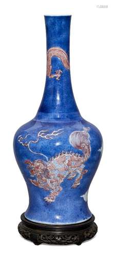 A rare Chinese porcelain powder blue ground bottle vase, Kangxi period, painted in underglaze blue