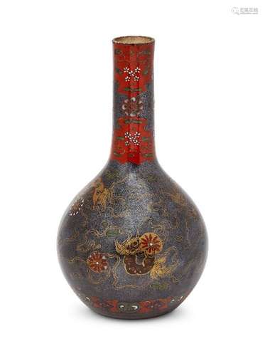 A Chinese porcelain monochrome bottle vase, 17th century, covered with a black silver-speckled