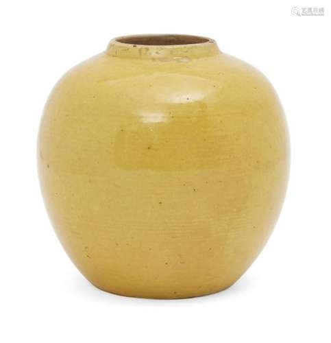 A Chinese porcelain monochrome jar, Jiaqing mark and of the period, covered in an egg-yolk yellow