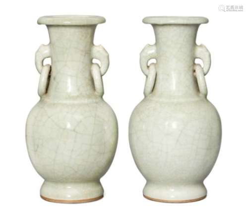 A pair of Chinese celadon porcelain vases, late 19th century, with allover crackle glaze and moulded