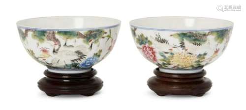 A pair of Chinese porcelain bowls, Republic period, painted in famille rose enamels with red crested