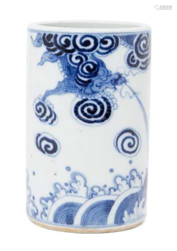 A Chinese porcelain cylindrical brush pot, Republic period, painted in underglaze blue with a dragon