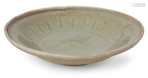 A Chinese stoneware Longquan celadon dish, Yuan dynasty, decorated to the shallow interior with a