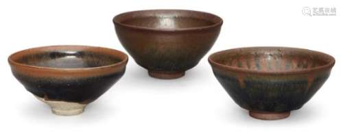 Three Chinese stoneware Jian hare's fur tea bowls, late Qing dynasty, 13cm - 12cm diameterSome minor