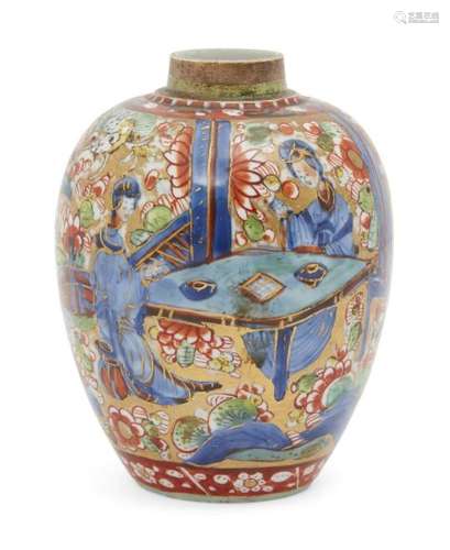 A Chinese porcelain 'clobbered' small ovoid jar, Kangxi period, painted in underglaze blue with