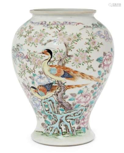 A Chinese porcelain baluster vase, early 20th century, painted in famille rose enamels with exotic