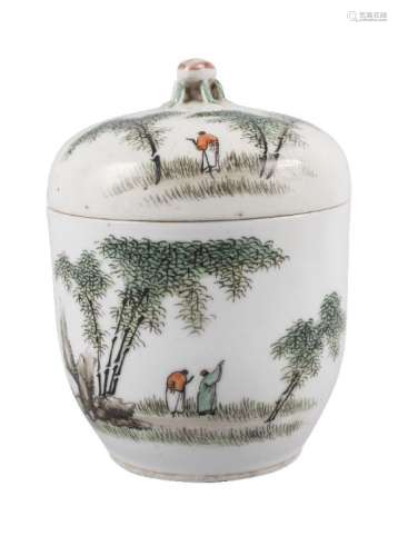 A Chinese porcelain circular box and cover, early 20th century, painted in enamels with a scholar in