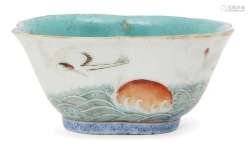 A Chinese porcelain lobed bowl, late 19th century, painted in famille rose enamels with cranes above