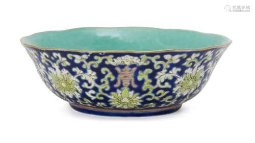 A Chinese porcelain bowl, Republic period, painted in enamels with scrolling lotus flowers and