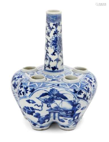 A Chinese porcelain six-section tulip vase, late 19th century, painted in underglaze blue with