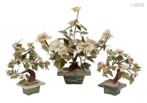 A garniture of three Chinese hardstone gem trees, early 20th century, each with rectangular base,