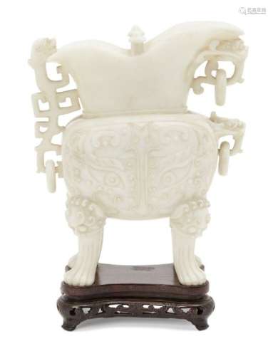 A Chinese white hardstone archaistic ritual pouring vessel, jue, early 20th century, carved with