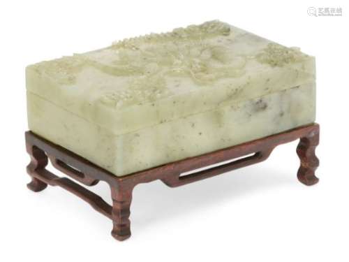 A Chinese hardstone rectangular box and cover, early 20th century, the cover carved in low relief