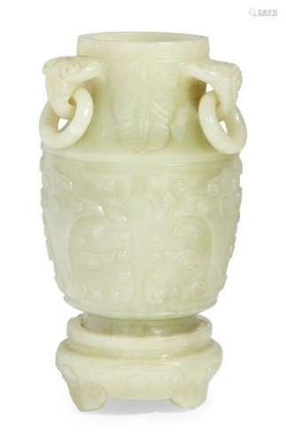 A Chinese green carved hardstone archaistic vase and stand, 20th century, with three lingzhi-form