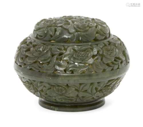 A Chinese Mughal-style spinach jade pierced box and cover, Qianlong period, profusely carved with