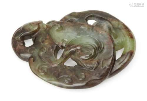 A Chinese green jade archaistic pendant, Qing dynasty, carved with a phoenix to one side and a