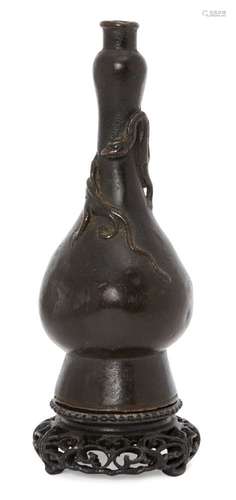 A Chinese bronze garlic-head vase, Ming dynasty, 17th century, with applied chi-long dragon around