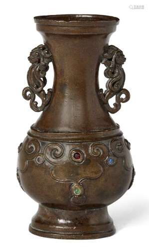 A Chinese bronze gem-set vase, Ming dynasty, 17th century, with finely cast mythical beast