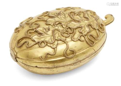 A Chinese gilt bronze 'melon' box and cover, 18th century, with lobed sides, decorated to the